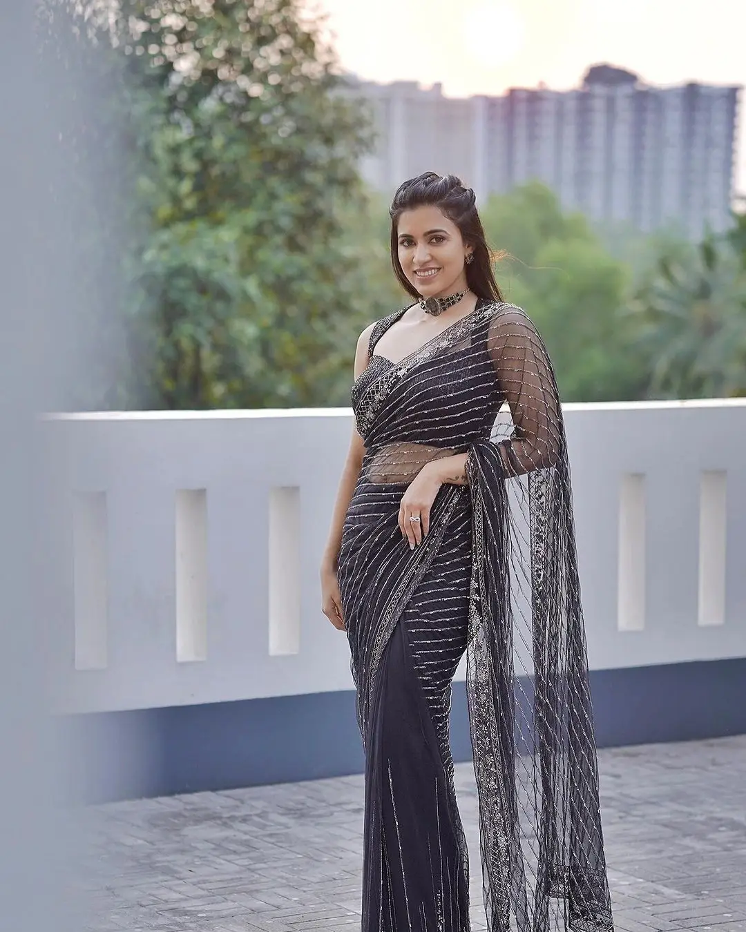 Tamil Actress Anju Kurian Stills in Sleeveless Black Saree